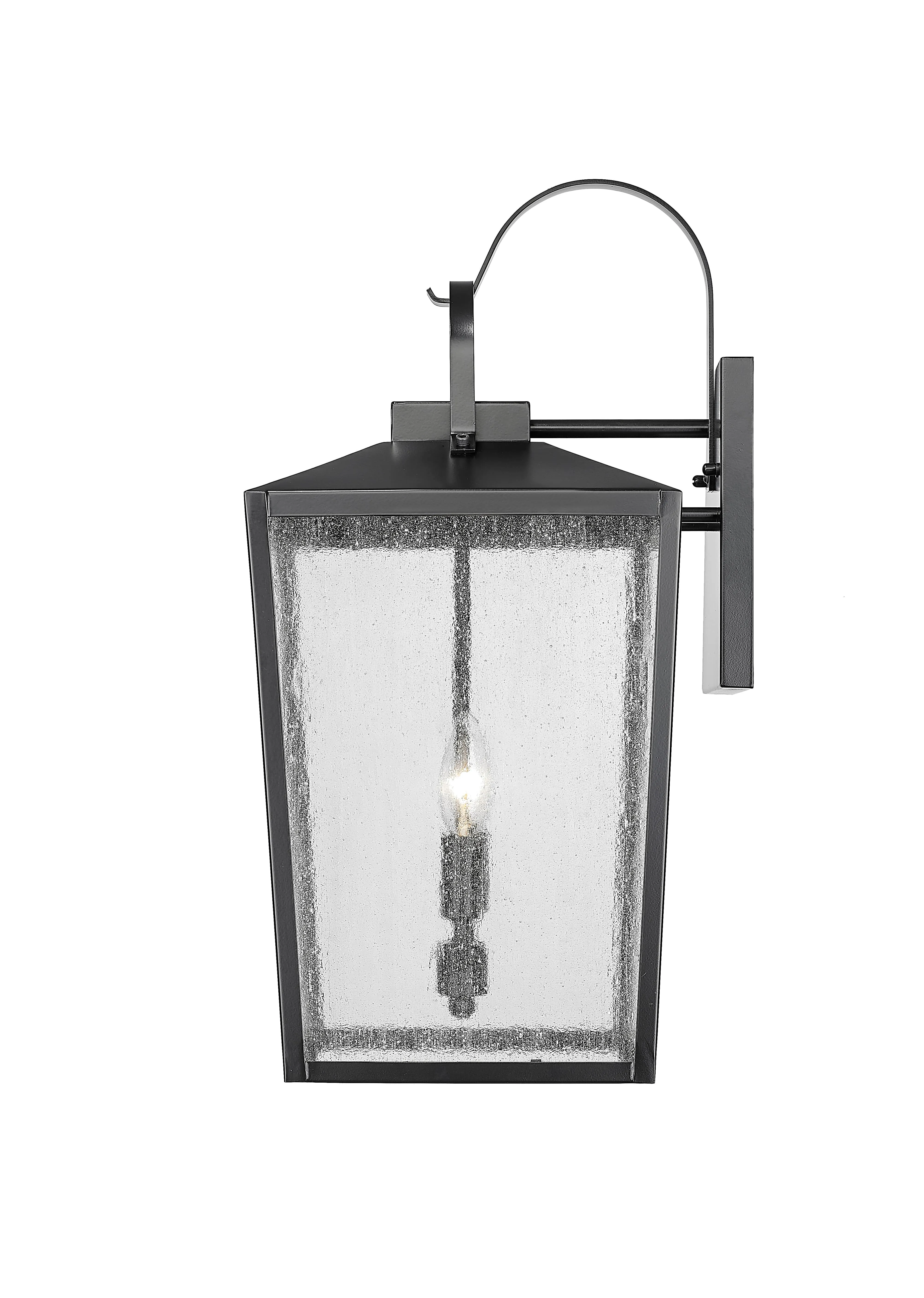 Devens Outdoor Wall Sconce - Powder Coated Black - Clear Seeded Glass - 12in. Extension - E26 Candelabra Base