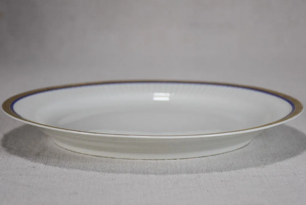 Vintage dinnerware with blue and gold trim