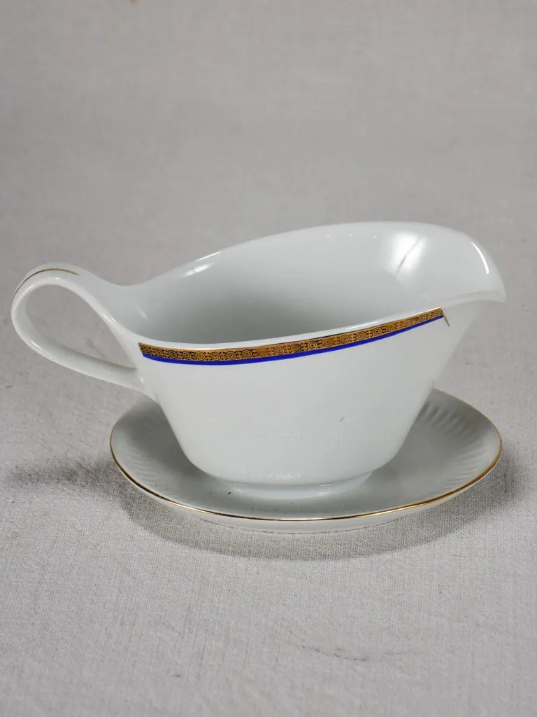 Vintage dinnerware with blue and gold trim